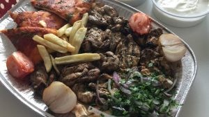 Various Syrian Food dishes like Kabab, Fatteh, and Kunafah