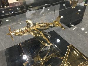 Embryer Tocano Aircraft Golden scale models @ The International Hunting Exhibition Abu Dhabi