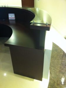 Laminate & acrylic curved counters with Solid surface counter tops