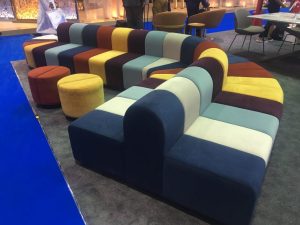 Segmented curvy sofa with multiple colors