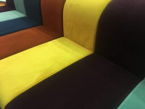 Segmented curvy sofa with multiple colors
